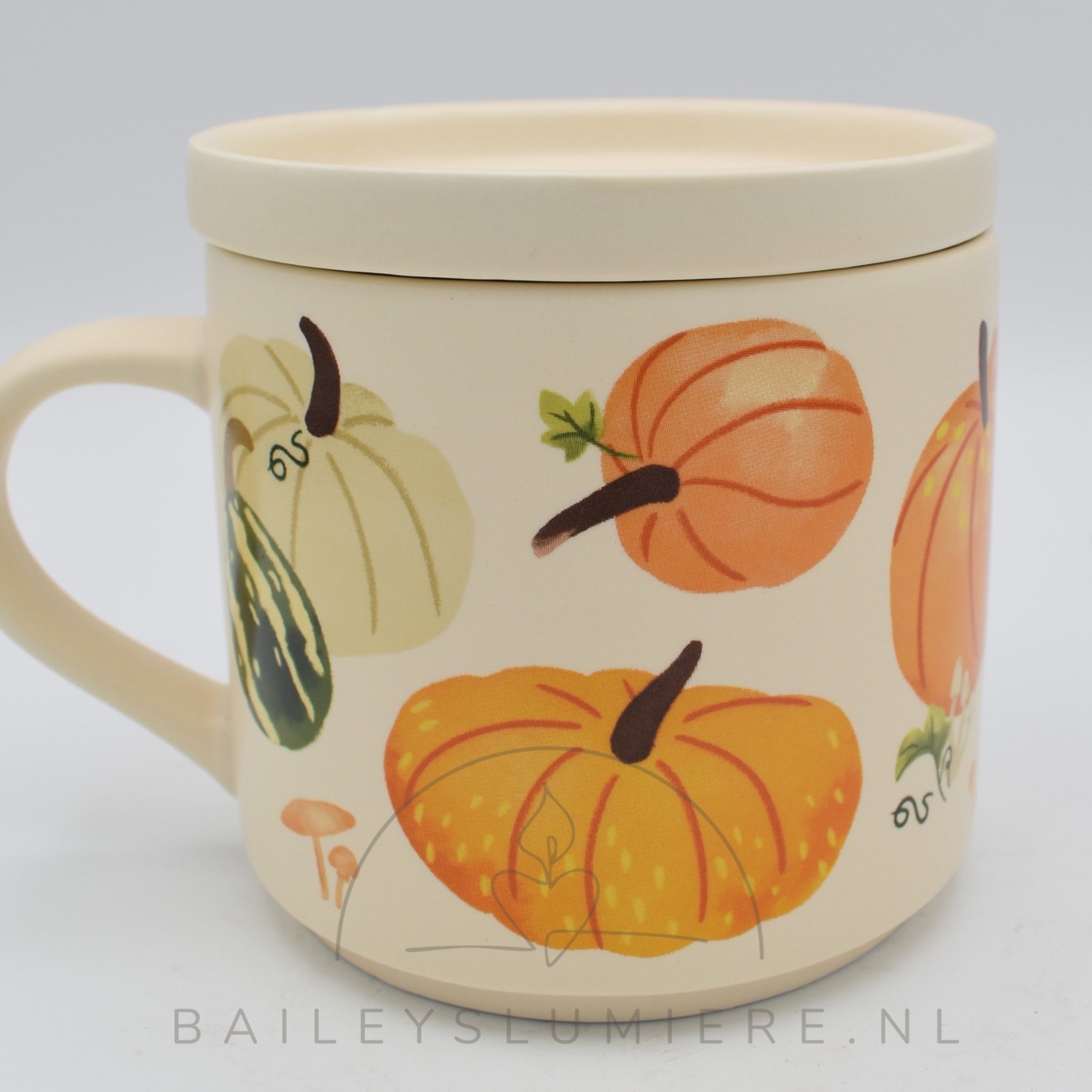 Herfst mok met pompoenprint.