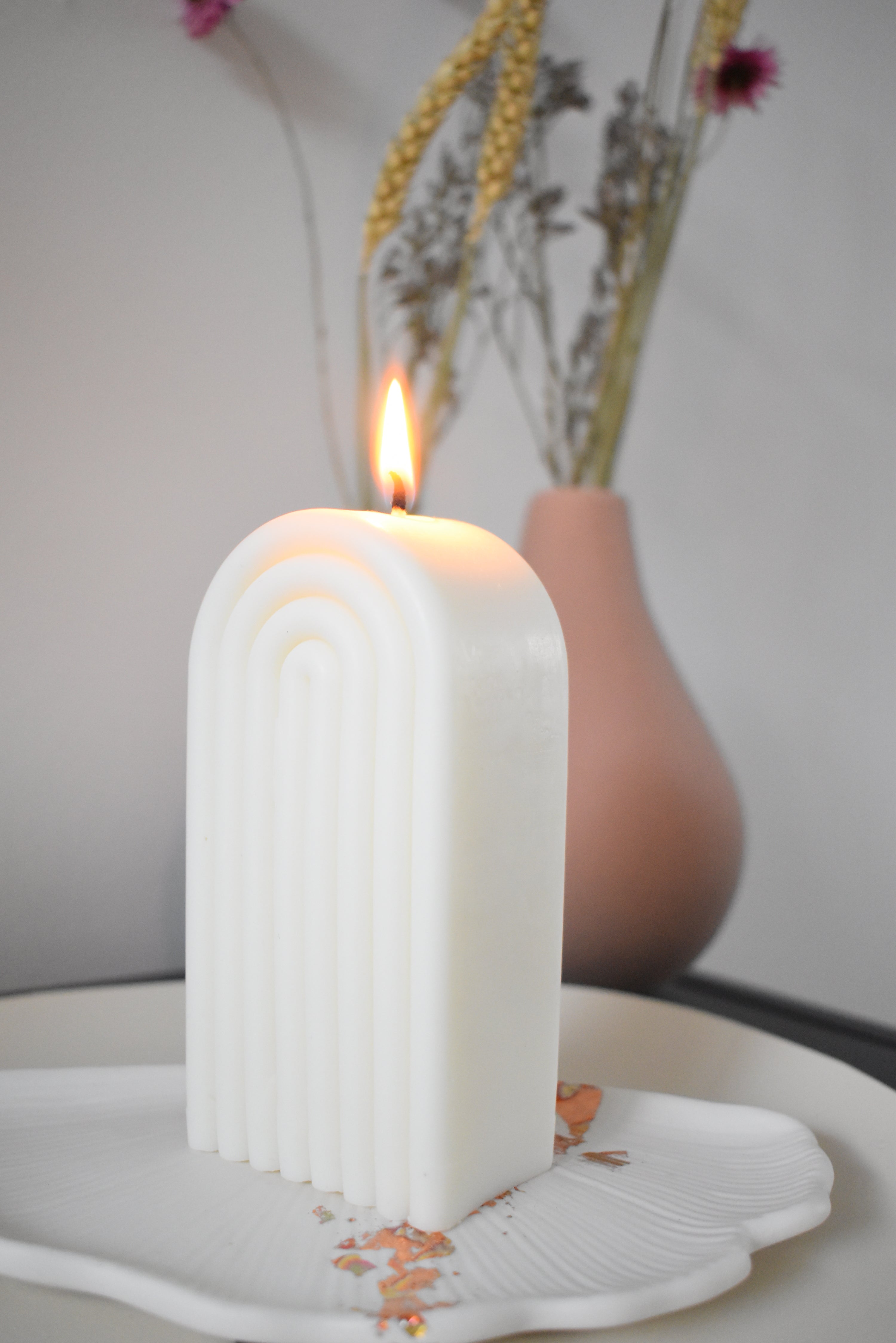 Regenboog pilaar kaars