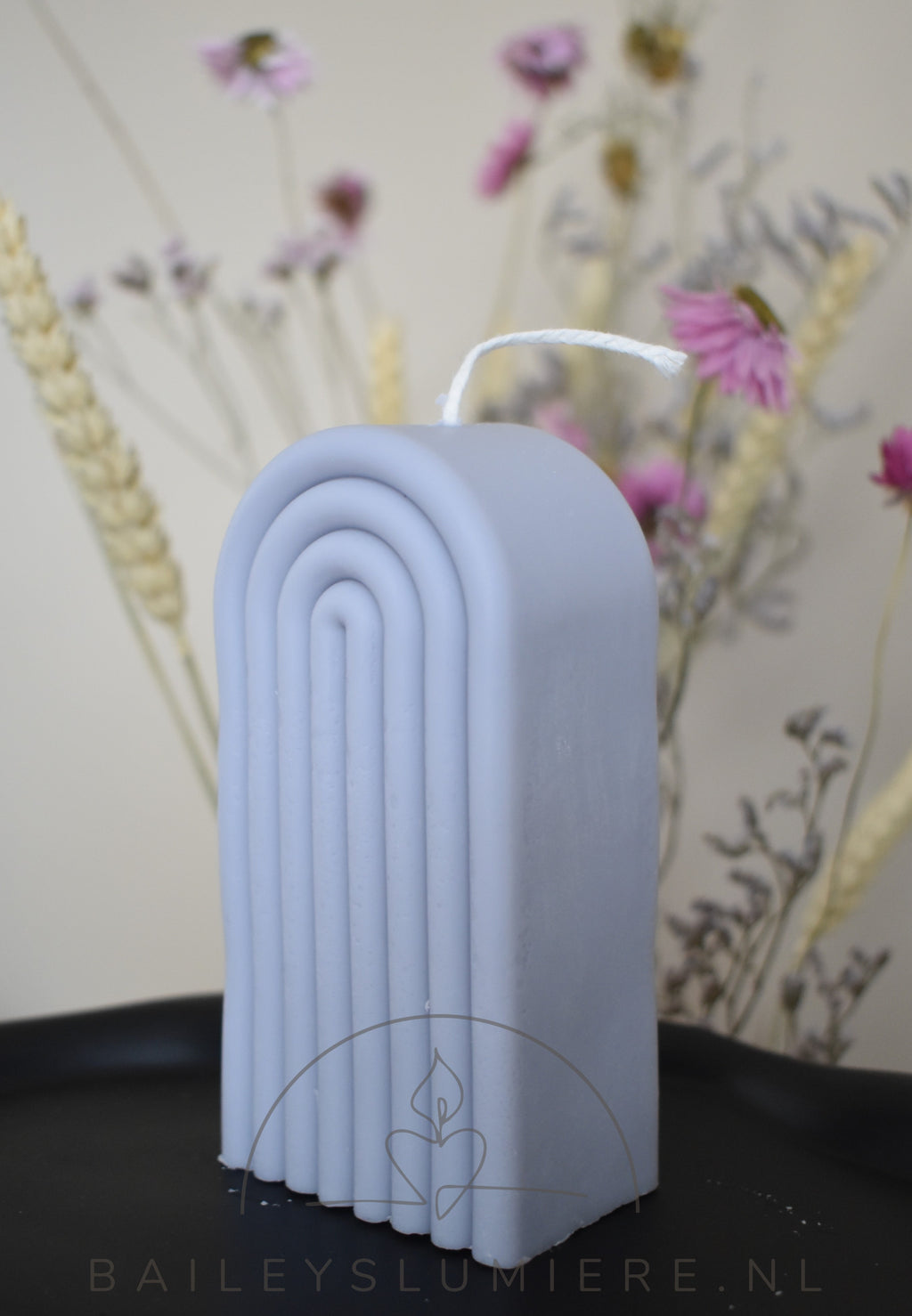 Regenboog pilaar kaars