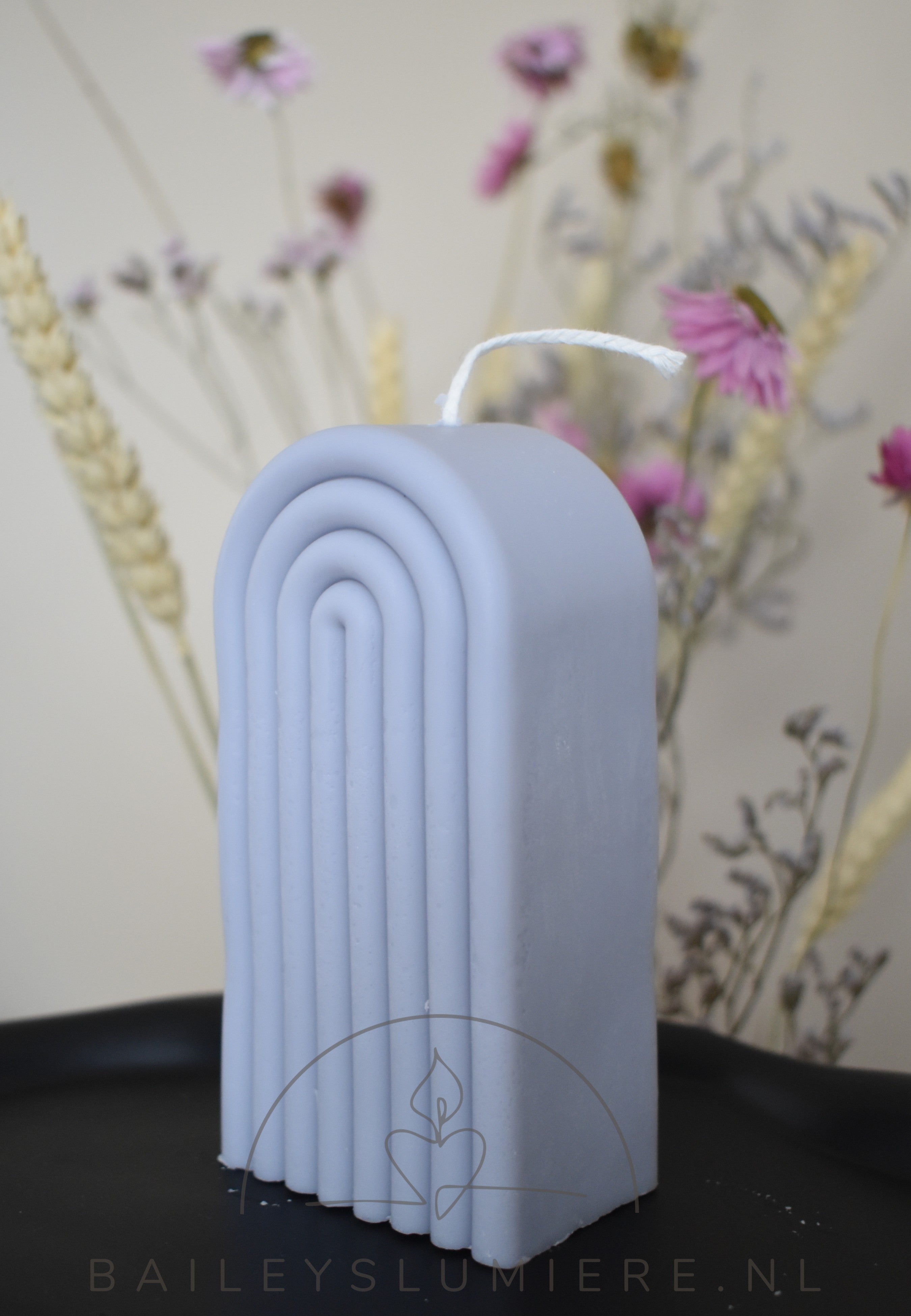 Regenboog pilaar kaars