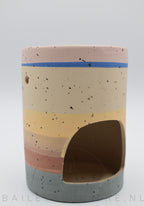 Aardetinten met spikkelpatroon brander.