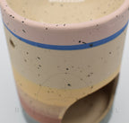 Aardetinten met spikkelpatroon brander.